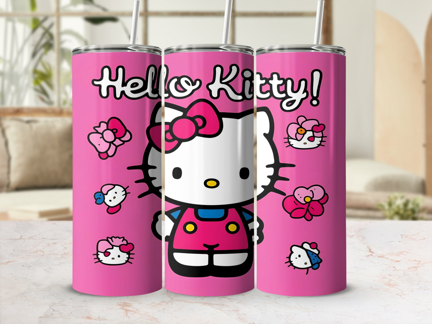 Pink tumbler with Hello Kitty character and bow.