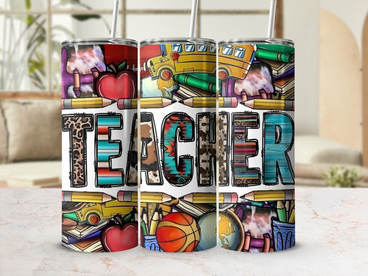 Teacher tumbler with colorful school supplies and apple pattern.