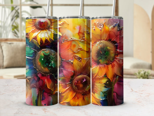 Three tumblers with vibrant, abstract sunflower designs.