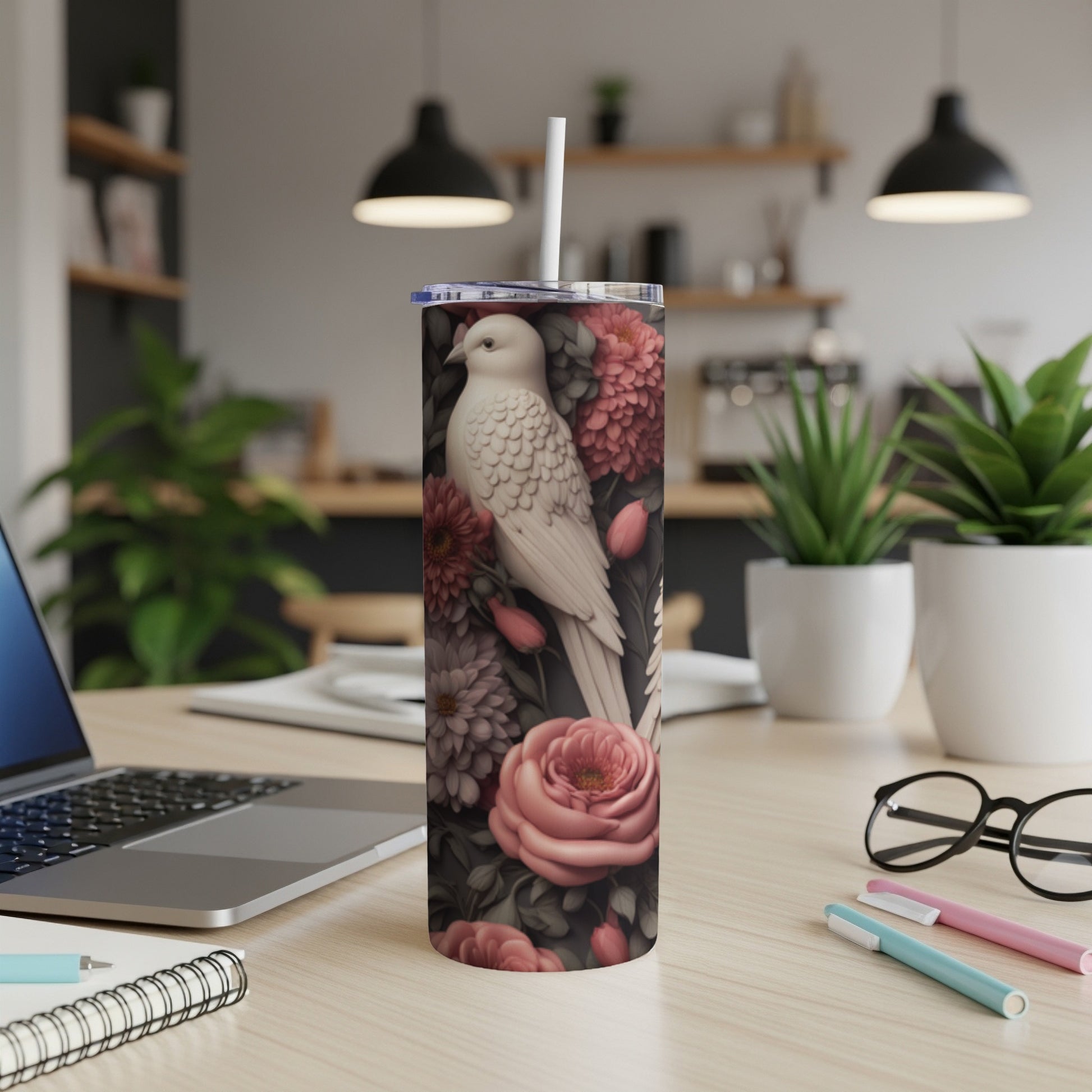 White dove and pink flowers on a tall tumbler cup.