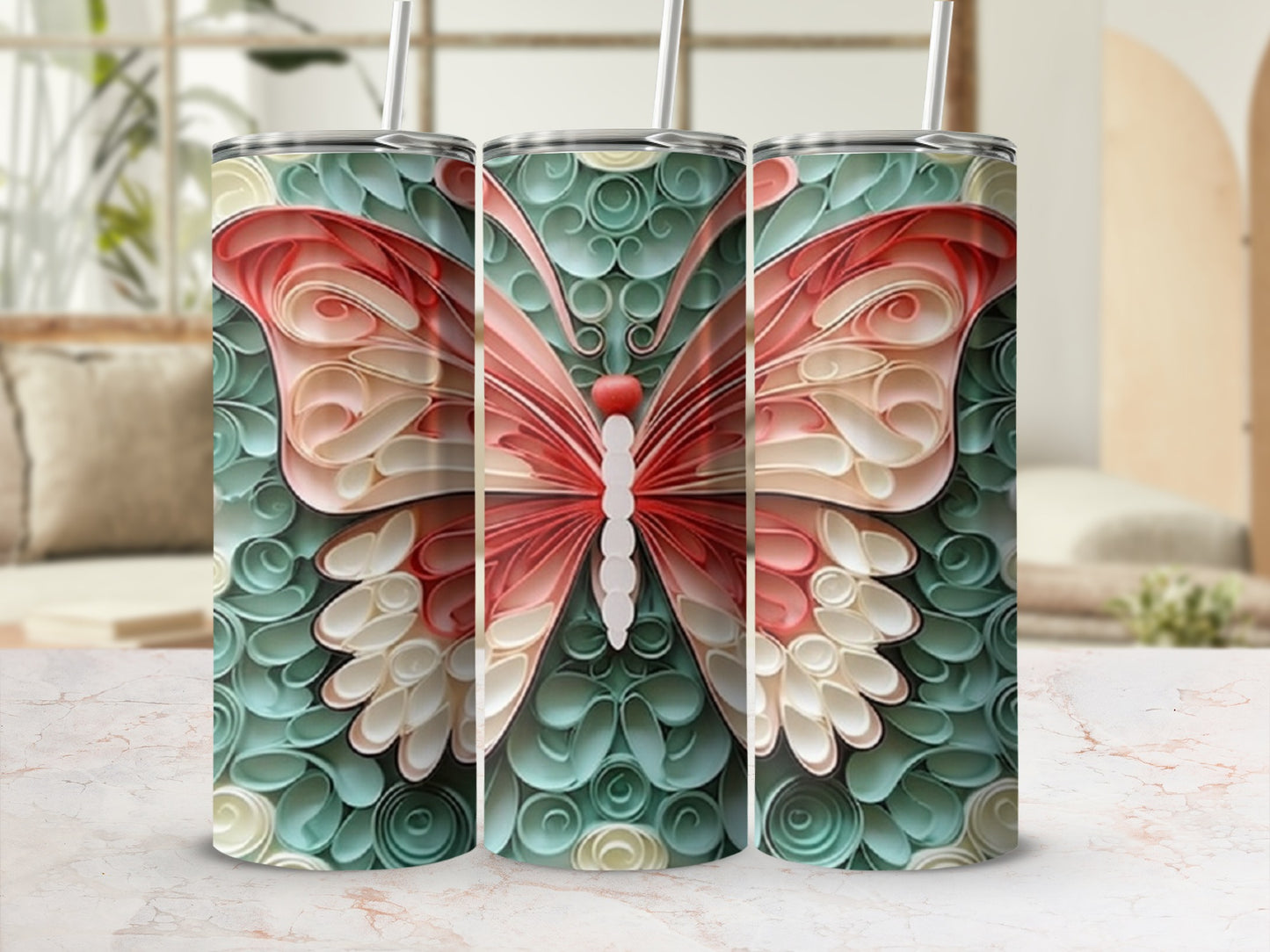 Tall tumbler with a pink and white butterfly design on a teal background.