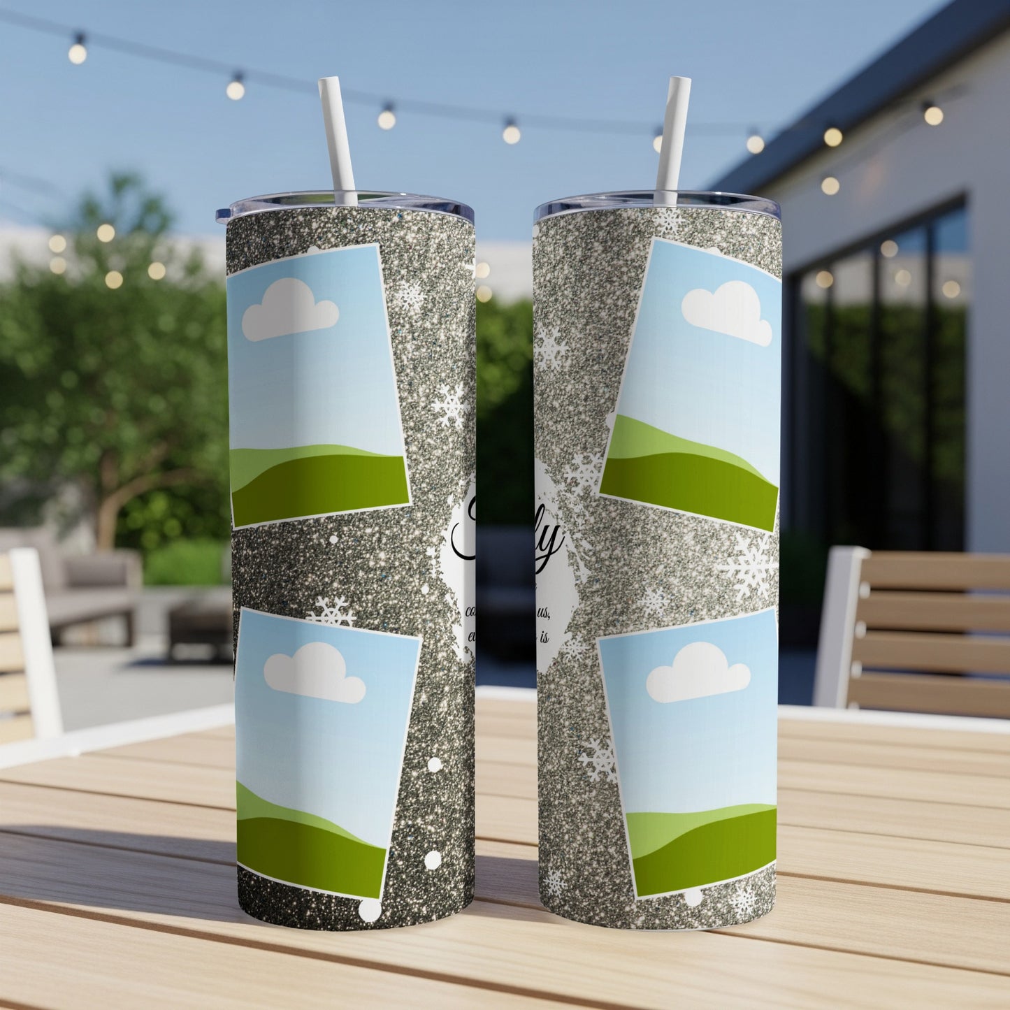 Two glitter tumblers with framed landscape photos and snowflake accents.
