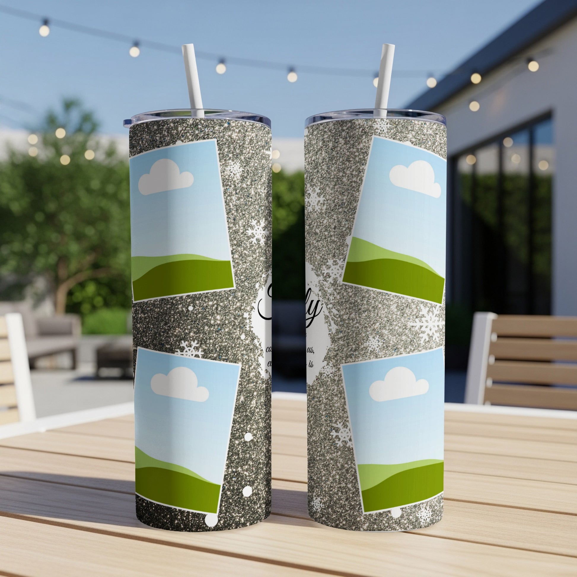 Two glitter tumblers with framed landscape photos and snowflake accents.