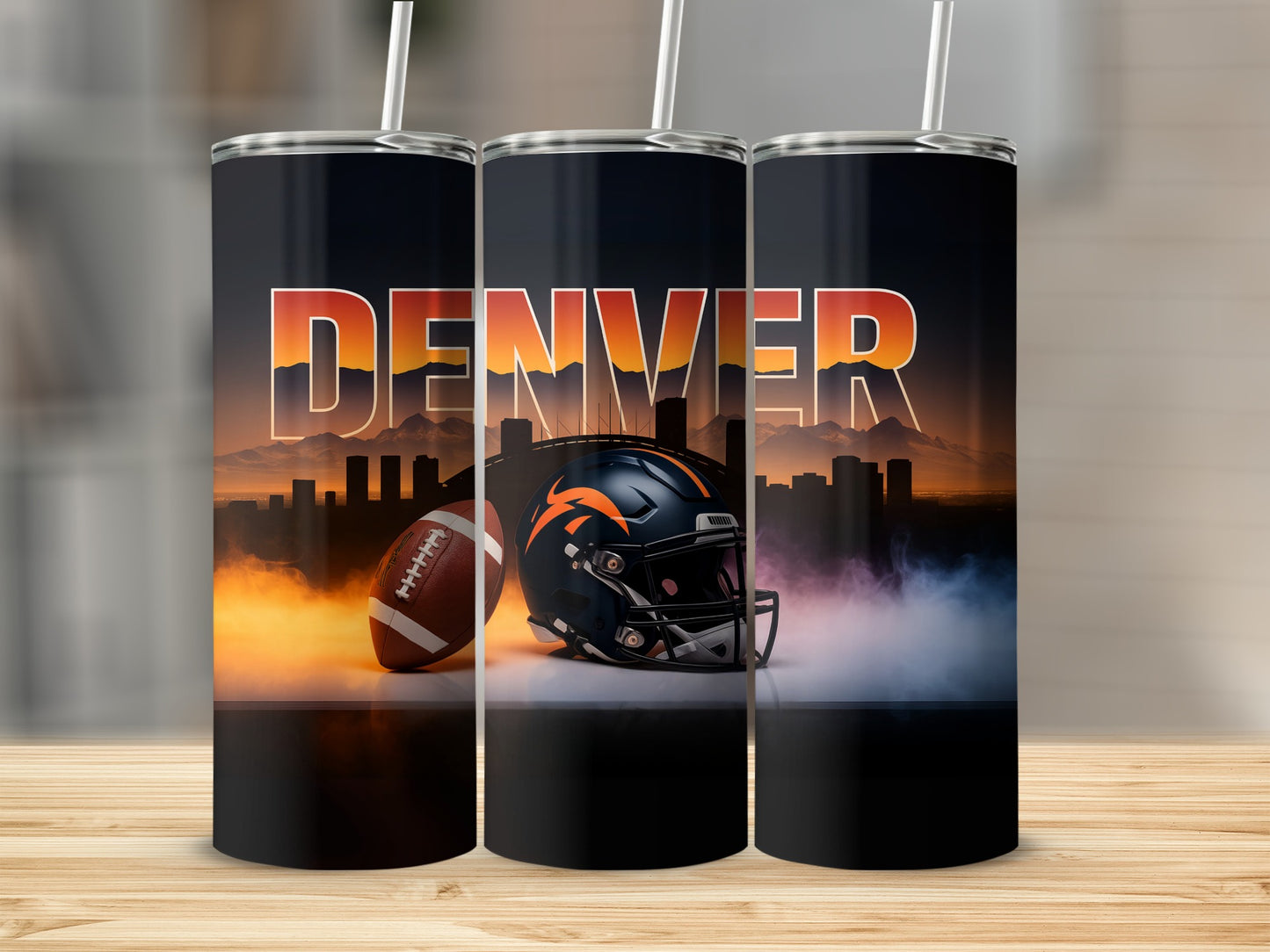 Denver Broncos helmet and football on city skyline background tumbler.