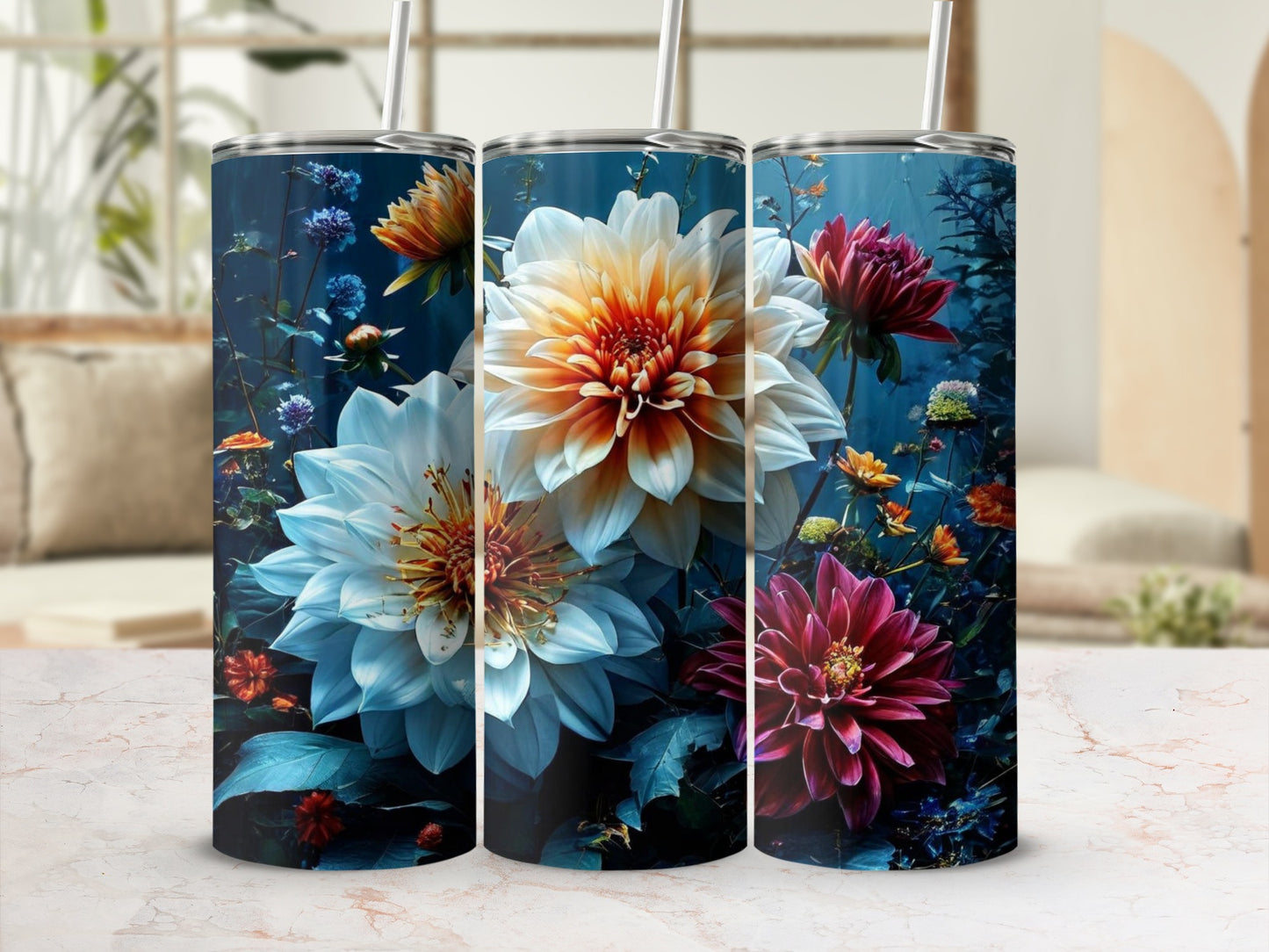 Three tumblers with a dark floral design featuring large, colorful dahlias.