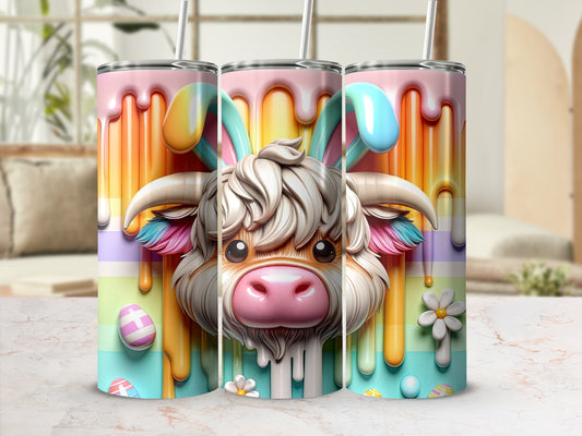 Bunny cow tumbler with dripping colorful glaze and Easter eggs.