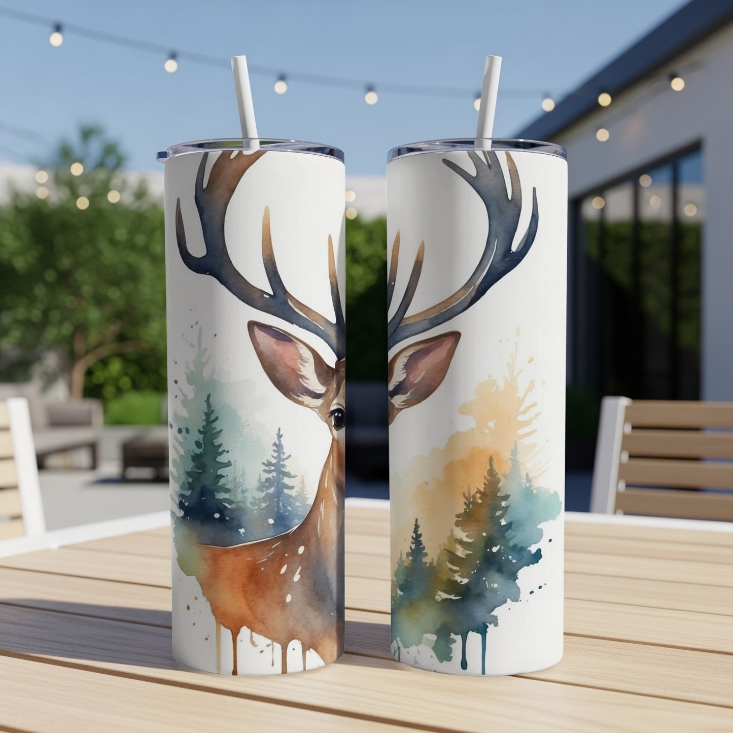 Two tumblers featuring a watercolor deer and pine trees.