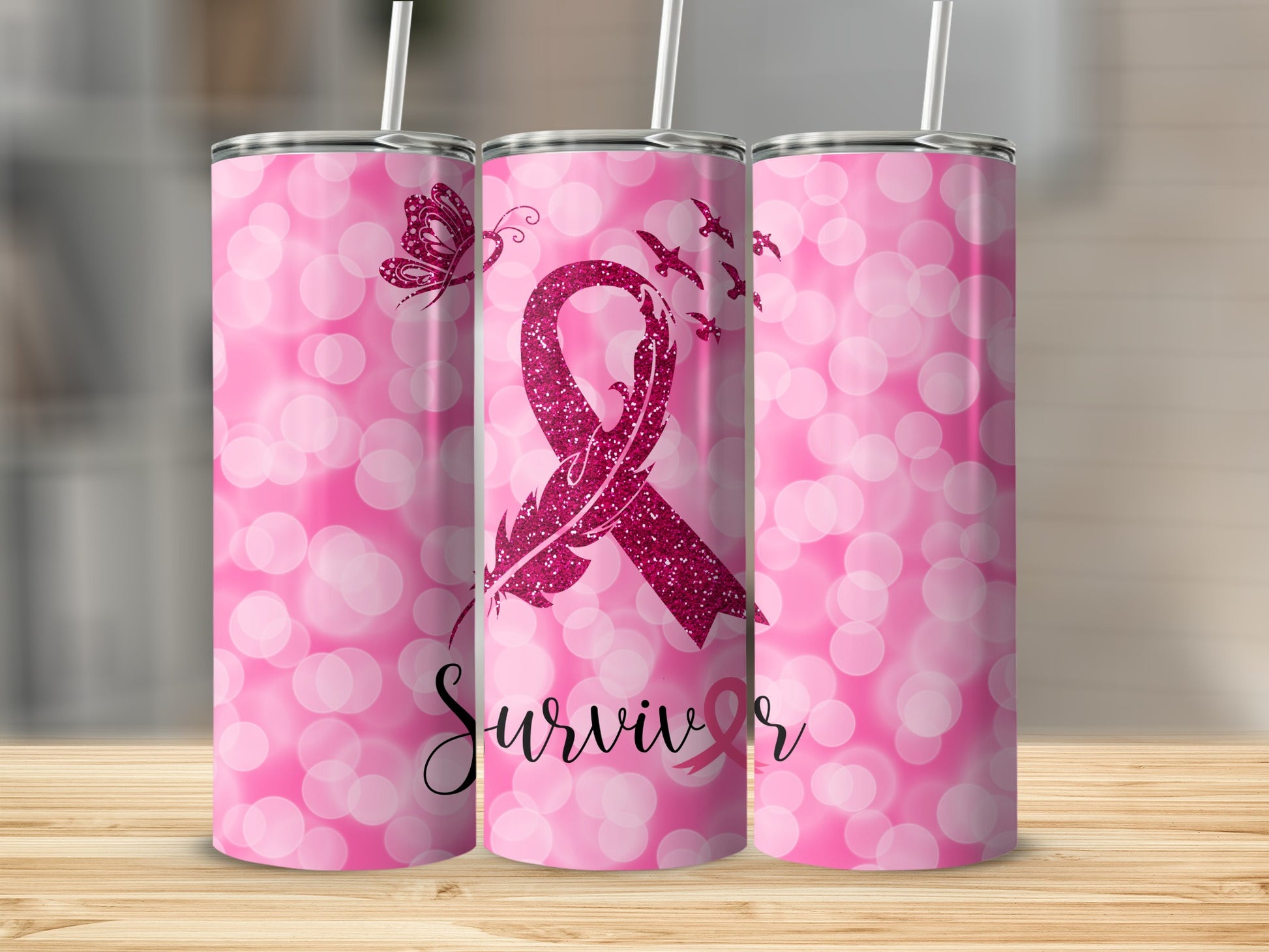 Pink glitter "Survivor" tumbler with butterfly and birds on bokeh background.