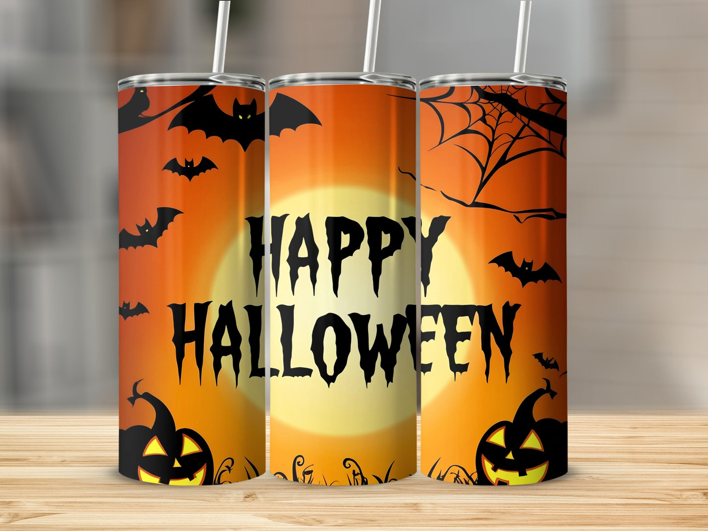 Three tumblers with a Halloween theme, featuring bats, pumpkins, and the text "Happy Halloween".