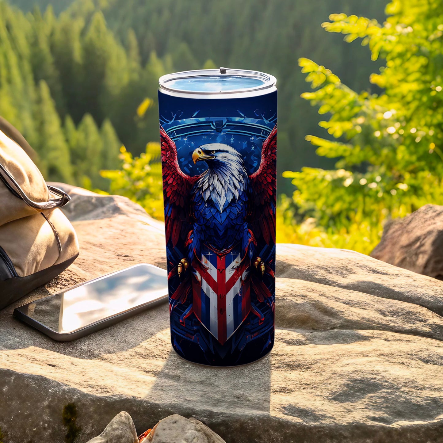 Tumbler with patriotic eagle design, set against a natural backdrop.