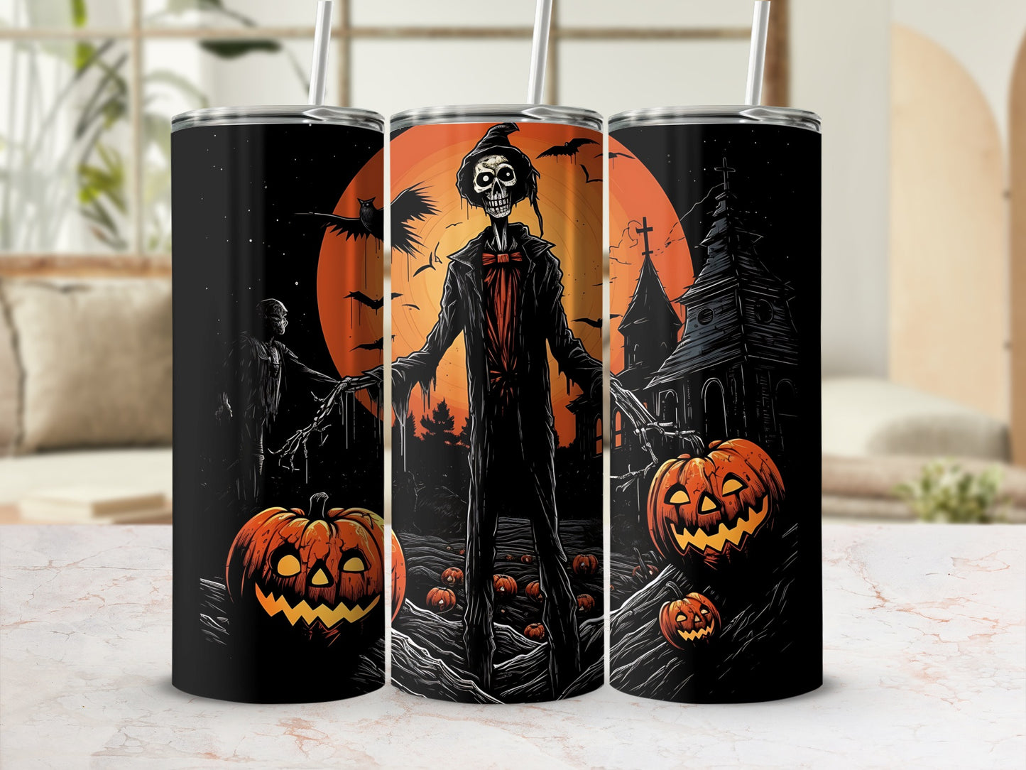 Halloween tumblers featuring a skeleton, bats, pumpkins, and a spooky haunted house.