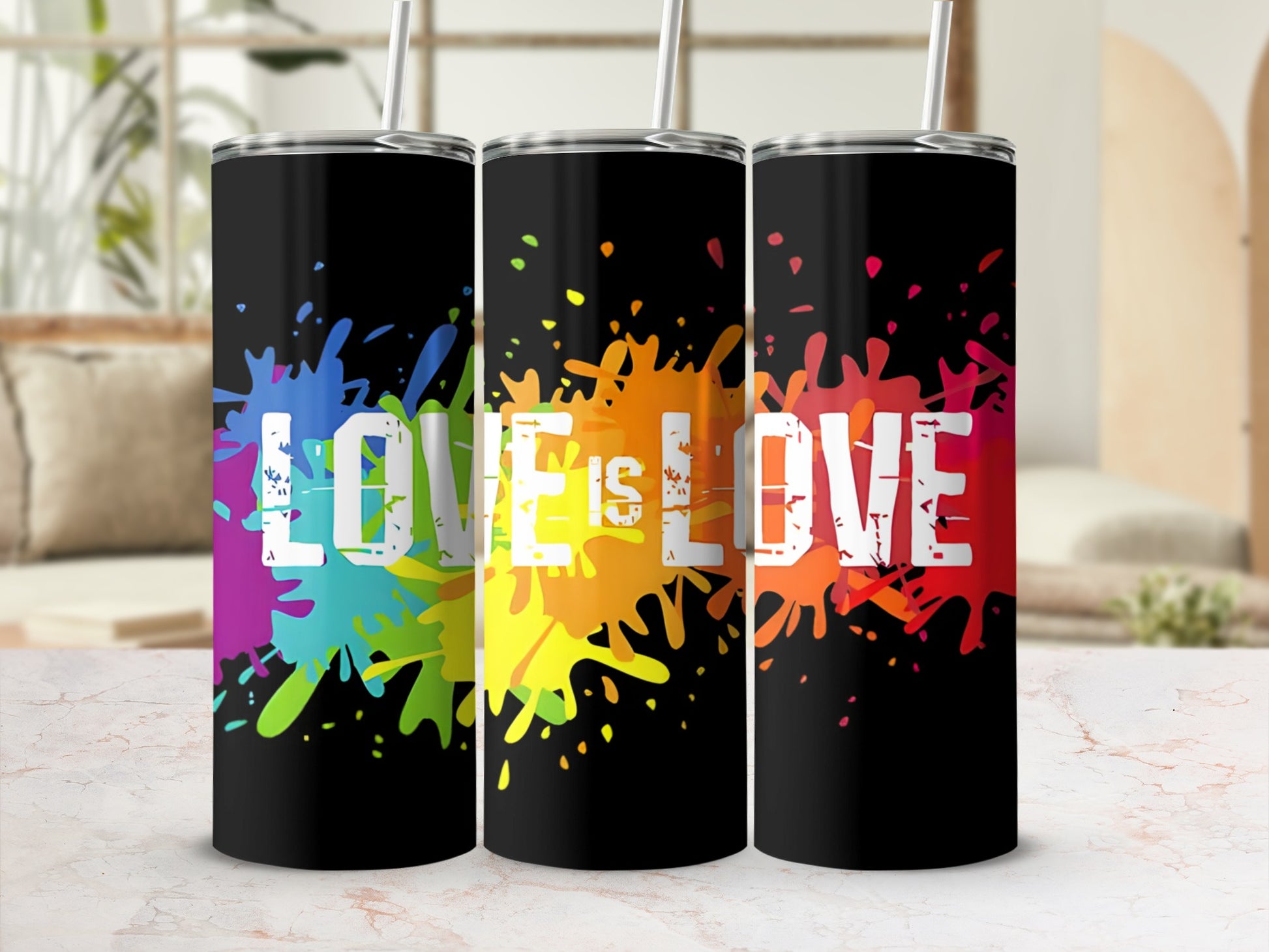 Three black tumblers with "LOVE IS LOVE" in colorful paint splatters.