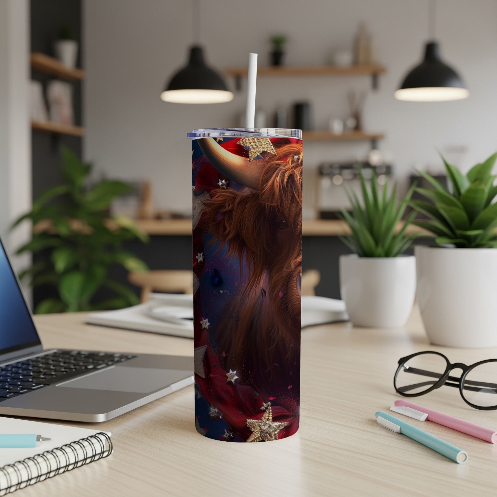Highland cow with American flag and stars design on a skinny tumbler.