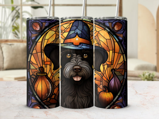 Black dog wearing a witch hat in stained glass design tumbler.