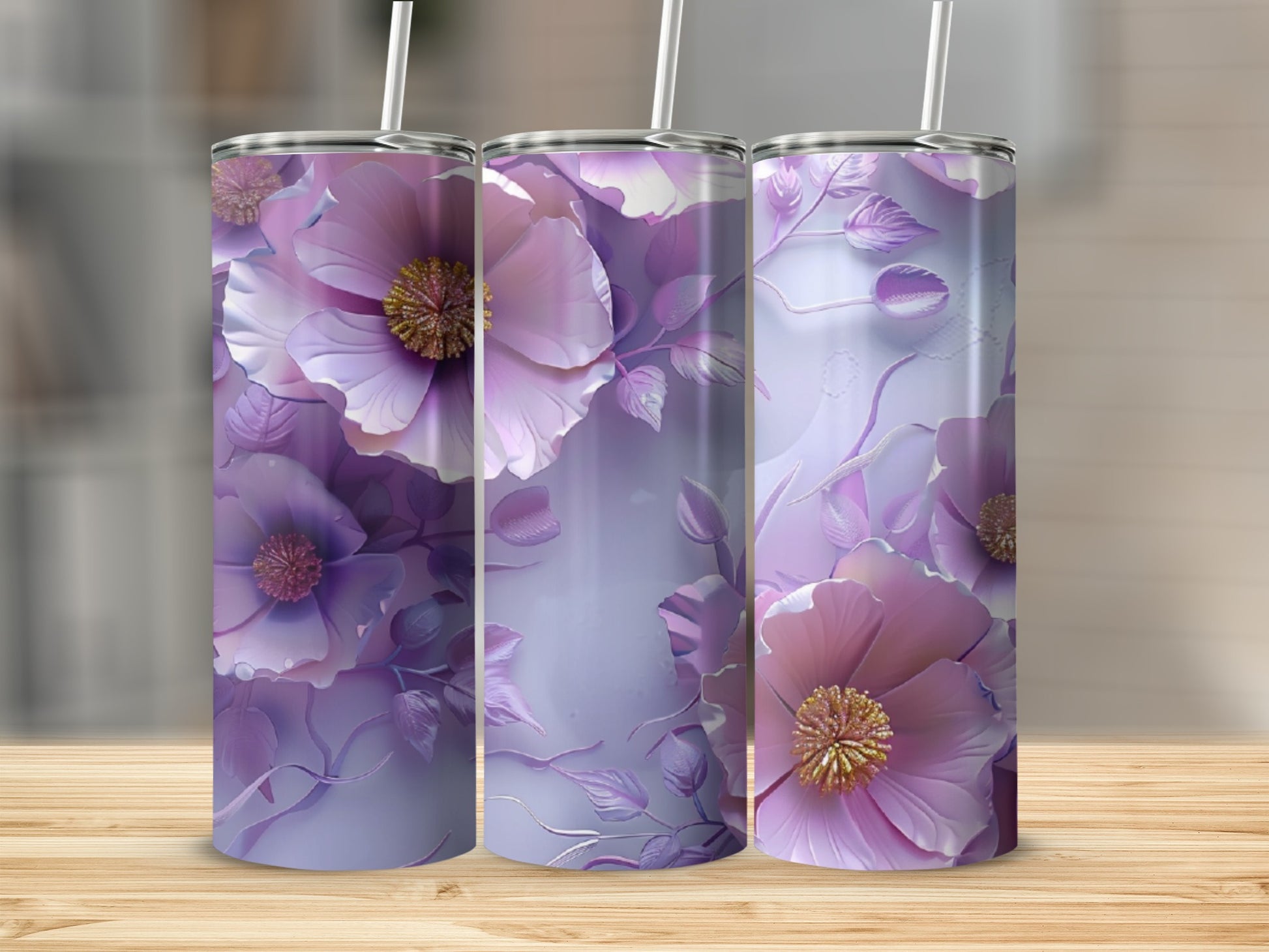 Three tall tumblers with embossed purple and pink floral designs.