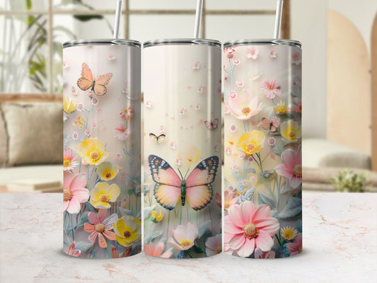 Floral tumbler with butterflies and pink, yellow, and white flowers.