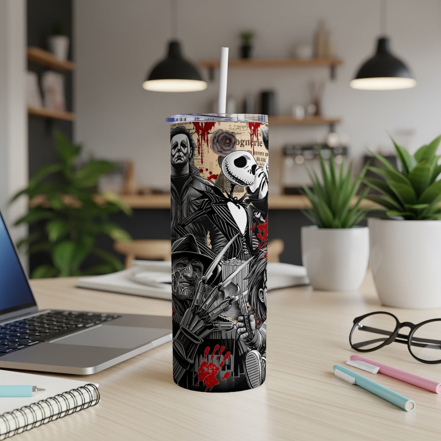 Tall tumbler featuring various horror movie characters and motifs.