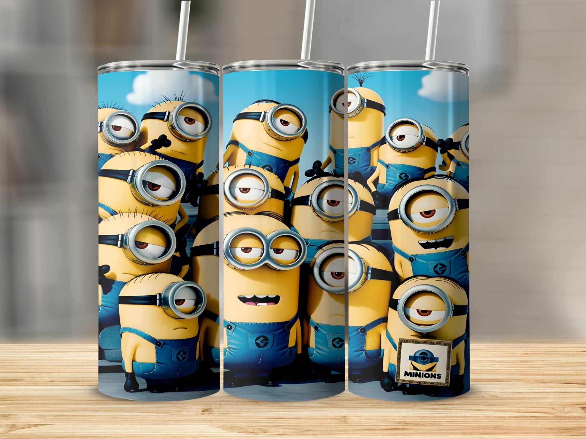 Three Minions-themed tumblers lined up, one with a "Minions" label.