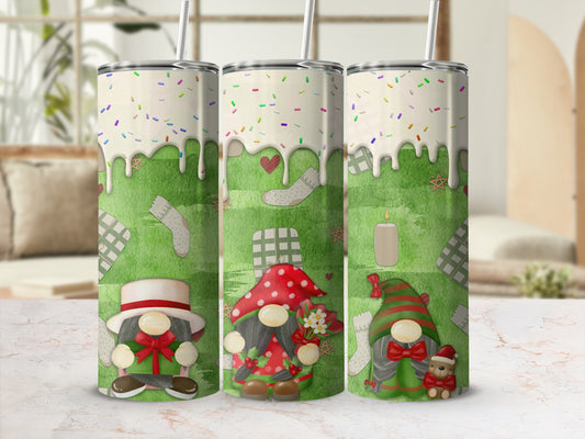 Three gnomes with festive designs on white tumblers with straws.