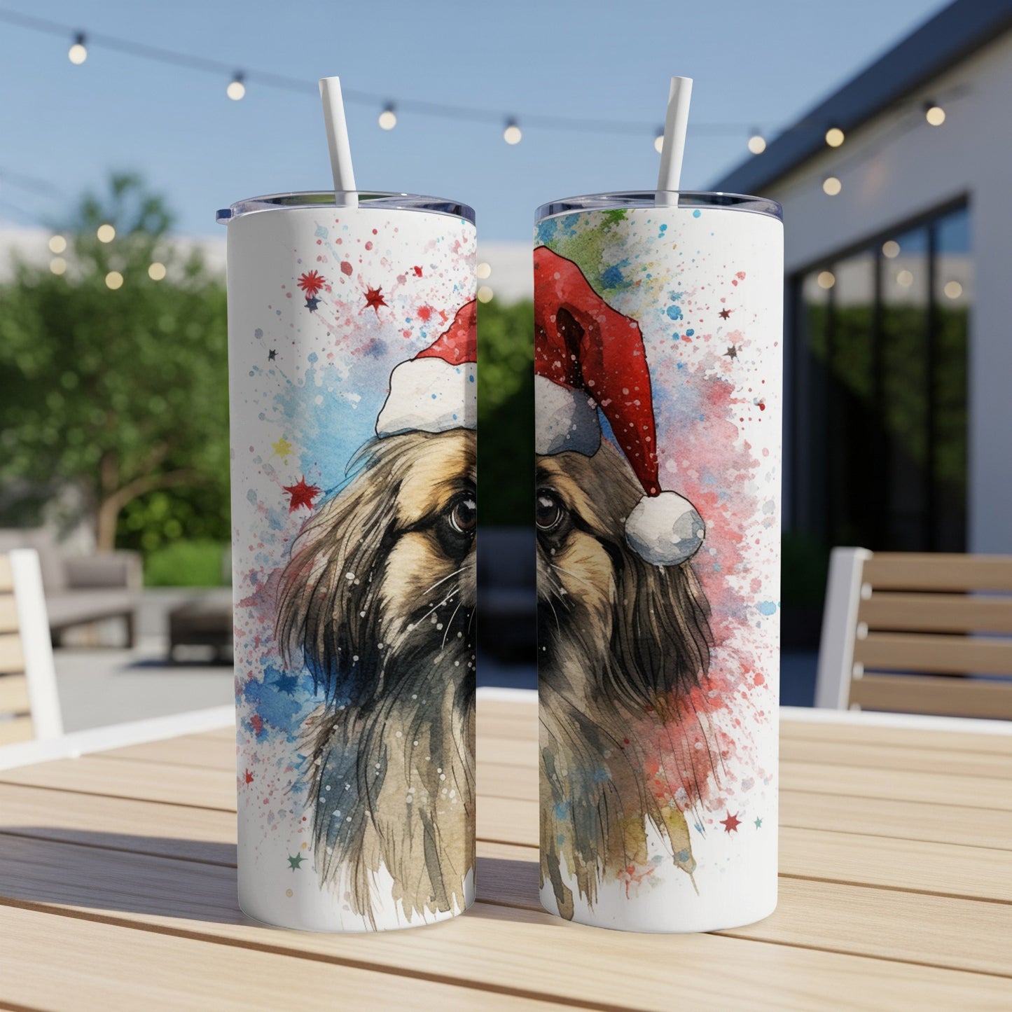 Two tumblers featuring a watercolor portrait of a dog in a Santa hat.