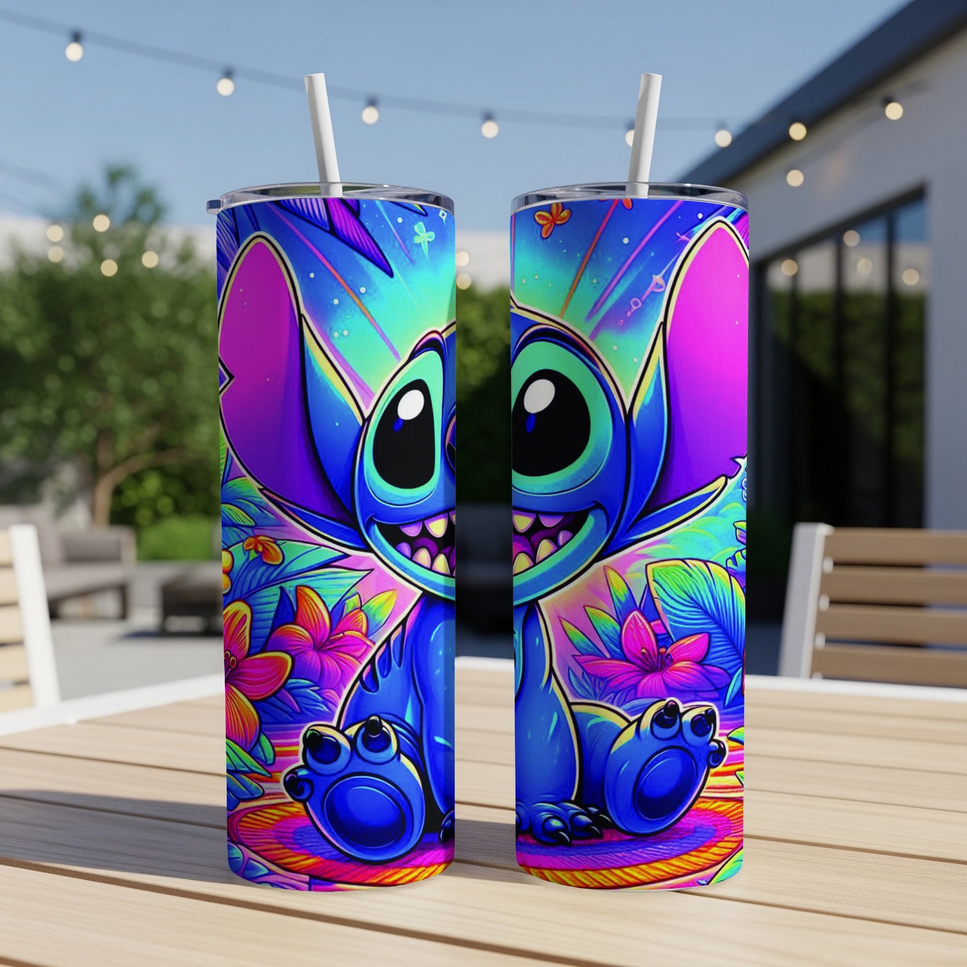 Two vibrant blue Stitch tumblers with colorful tropical background and straw.