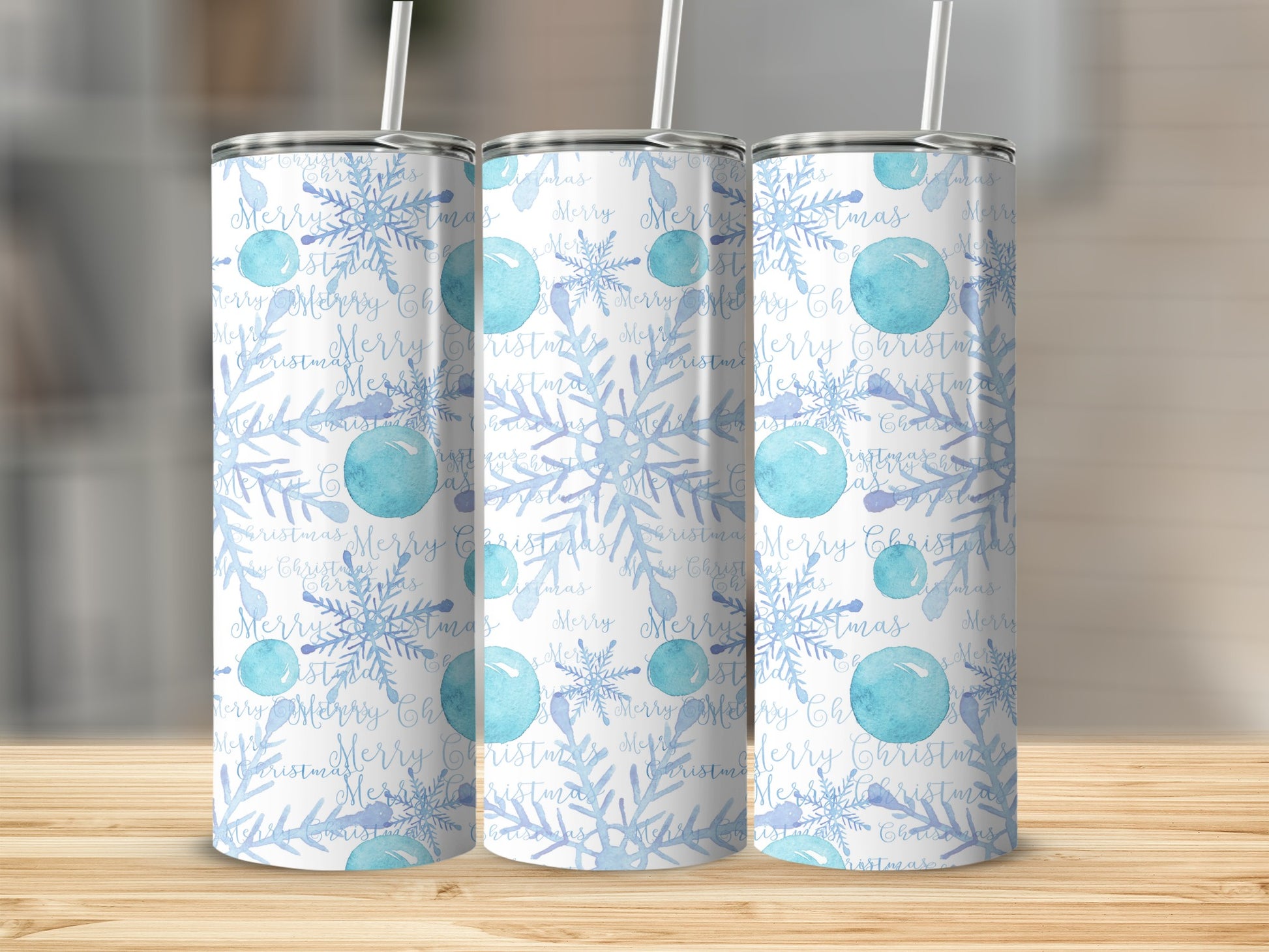Blue snowflakes and watercolor bubbles on a white tumbler with "Merry Christmas" text.