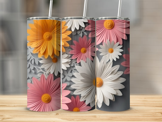 Three tumblers with floral patterns in pink, orange, and white against a gray background.