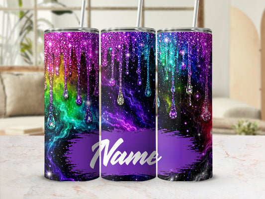 Three tumblers with rainbow glitter drips on a starry galaxy background.
