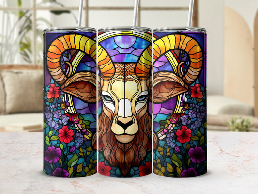 Stained glass Aries ram with floral accents on a tumbler.