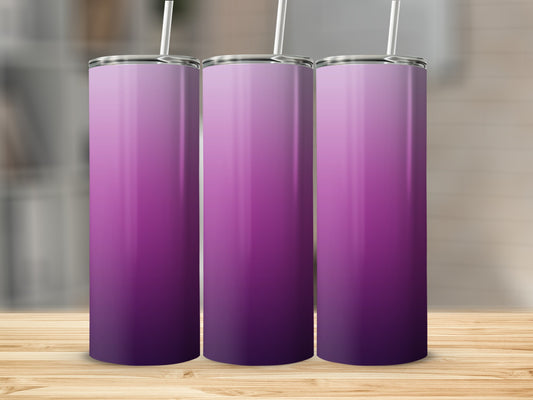 Three tumblers with a purple gradient design on a wooden surface.