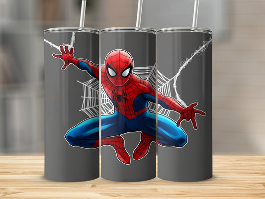 Spiderman in a web-slinging pose on a gray tumbler.
