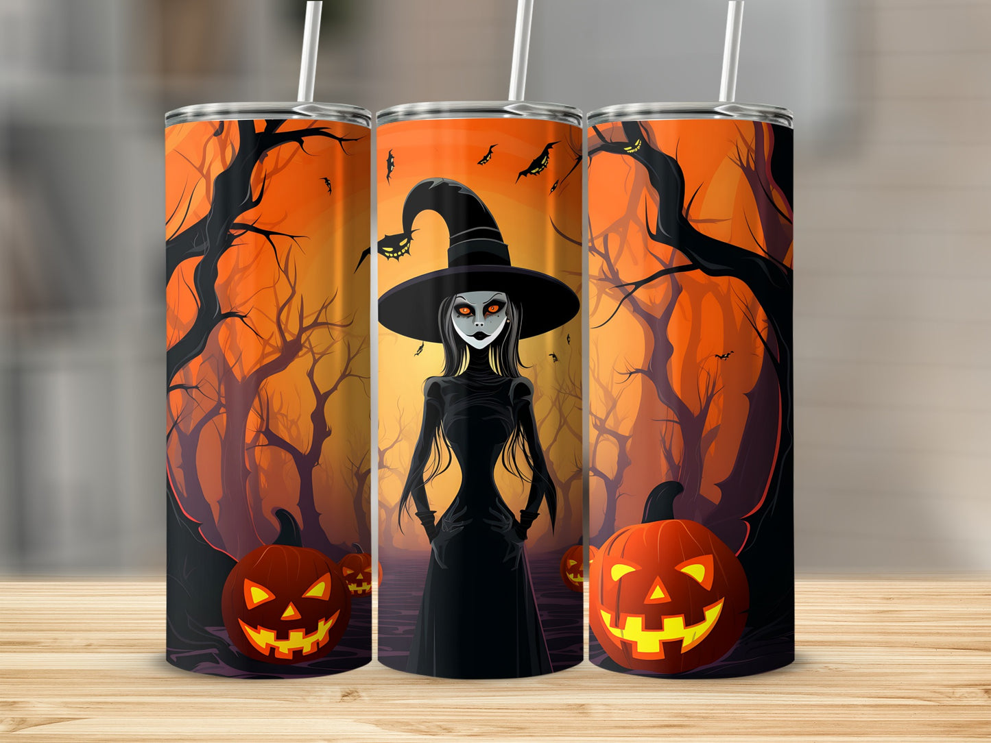 Three tumblers with Halloween theme: witch, pumpkins, and spooky trees.