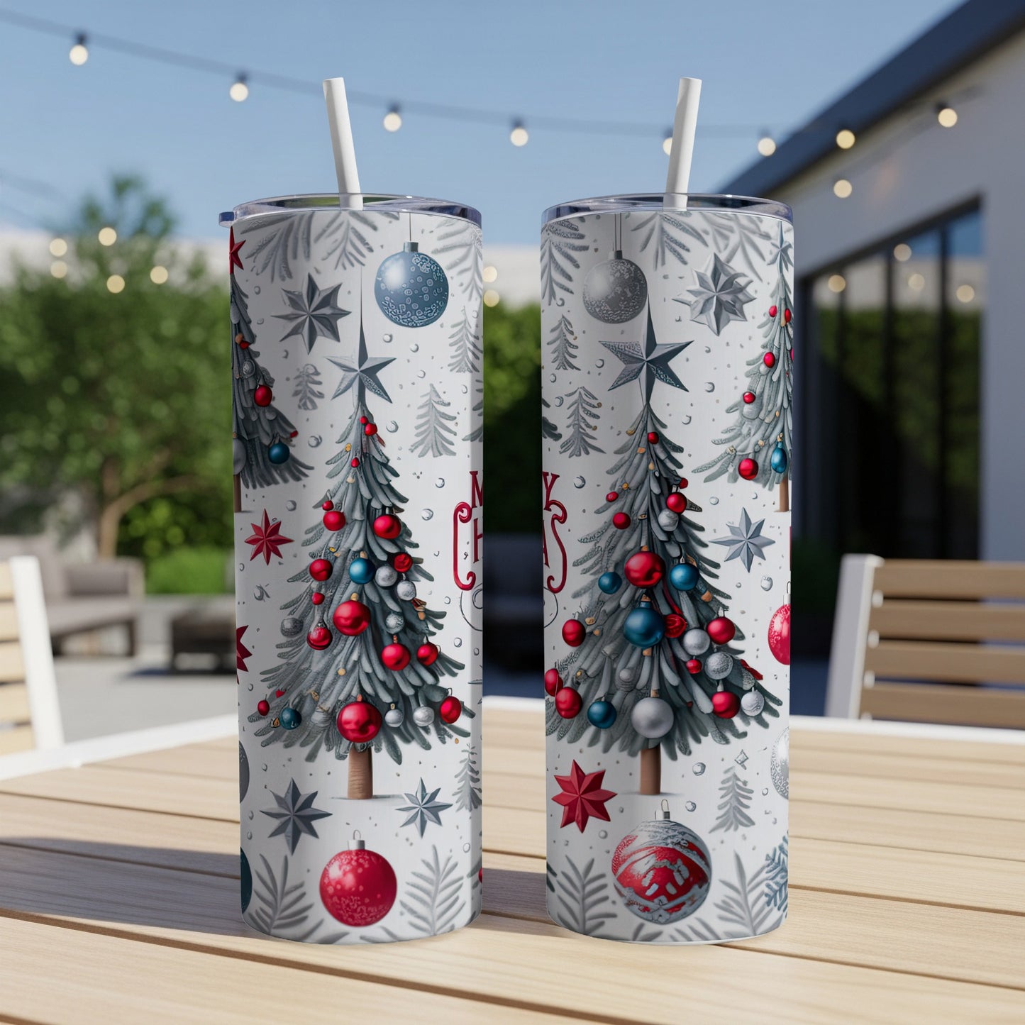 Two white tumblers with a Christmas tree and snowflake design.