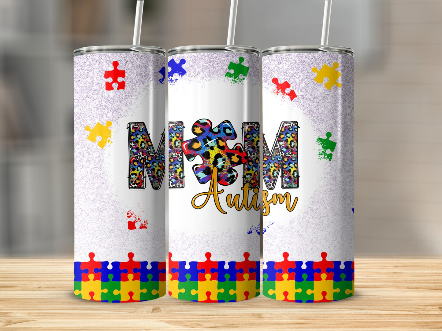 Autism puzzle piece tumbler with colorful leopard print "Autism" text.