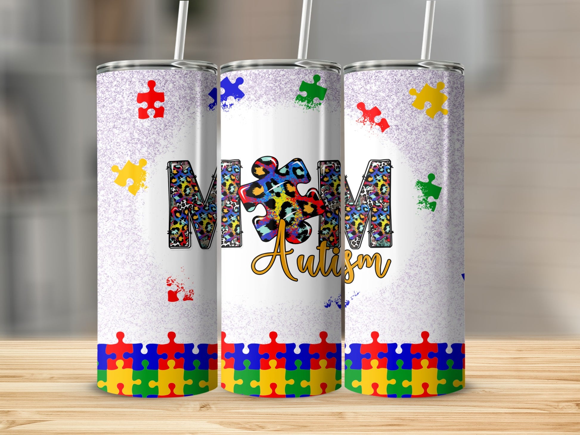 Autism puzzle piece tumbler with colorful leopard print "Autism" text.