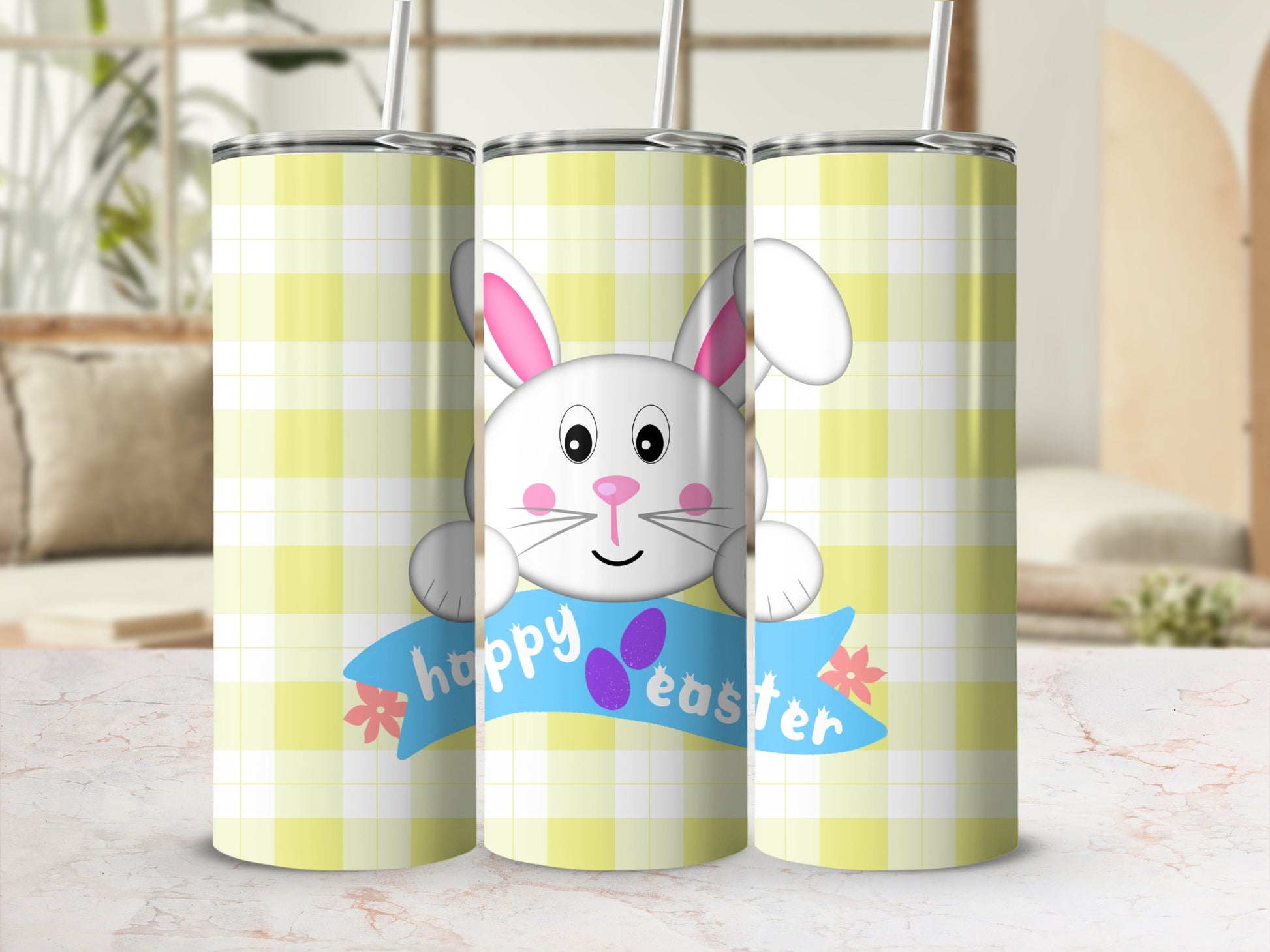 Three tumblers with a happy Easter bunny and pastel plaid pattern.