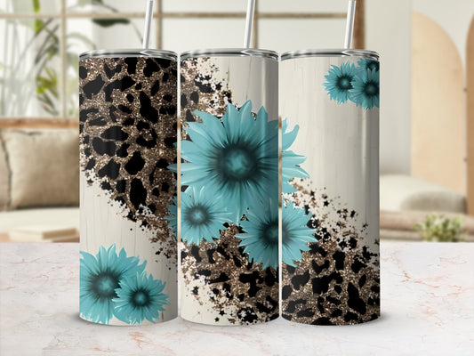 Three tumblers with leopard print, teal flowers, and glitter accents.