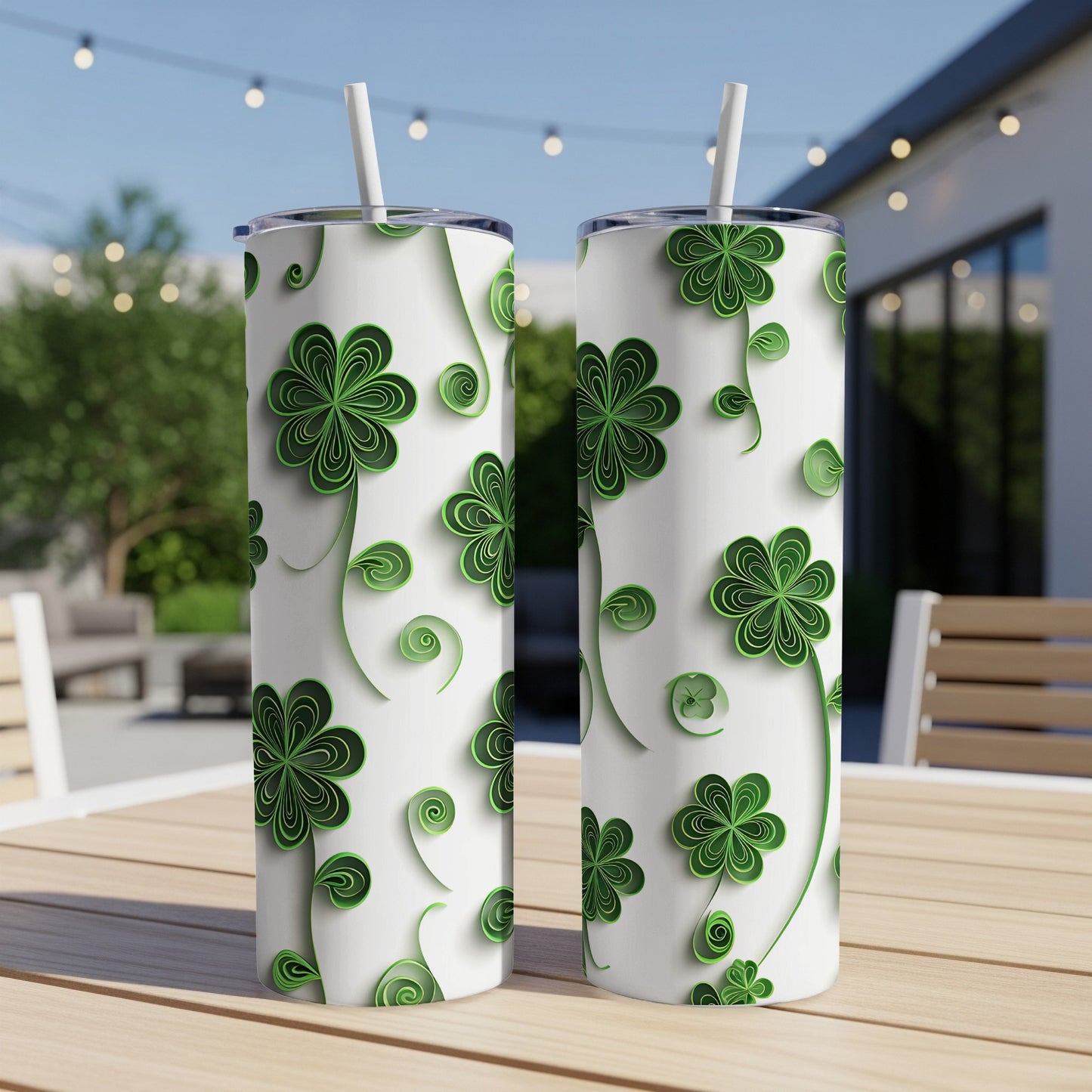 White tumblers with green shamrock and swirl pattern.