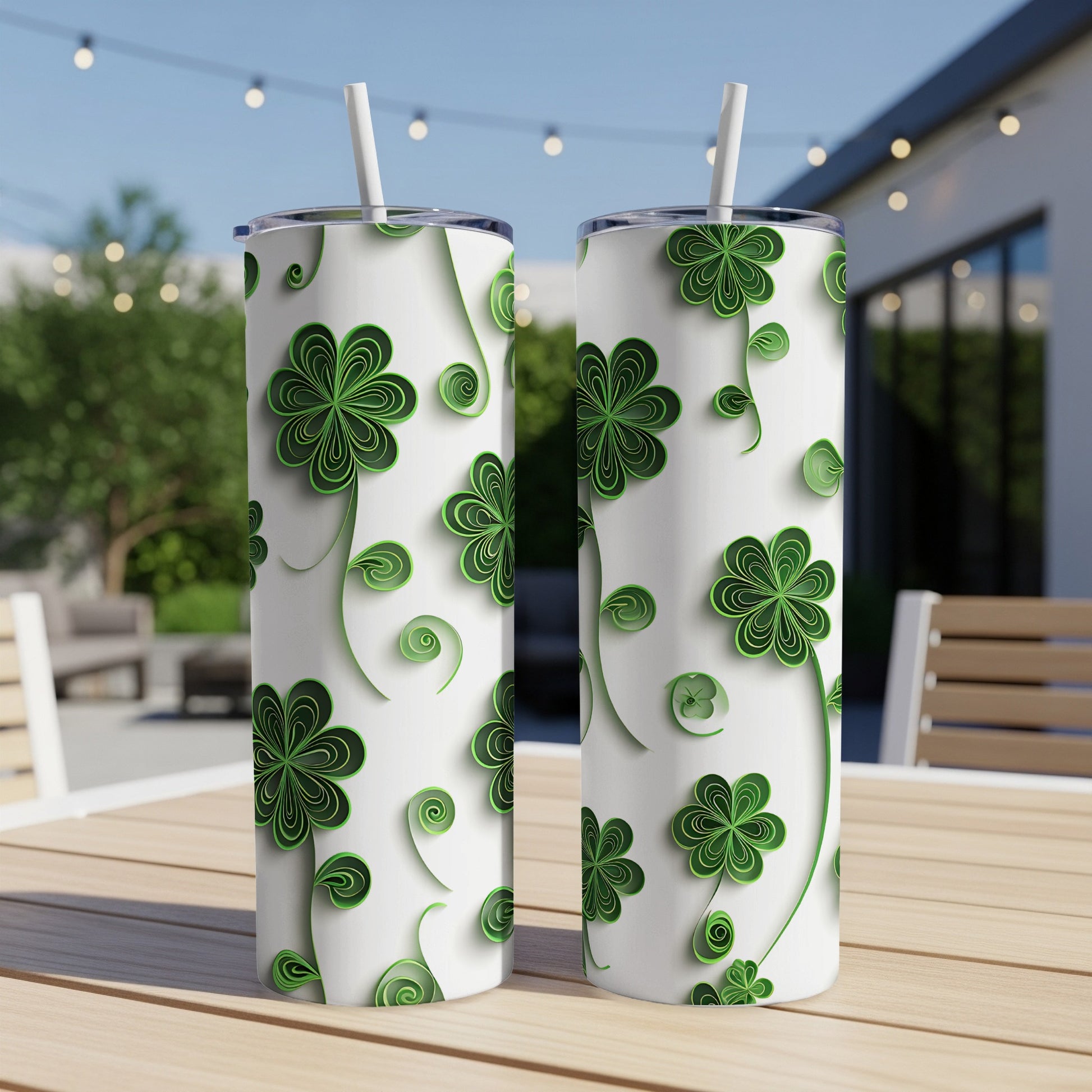 White tumblers with green shamrock and swirl pattern.