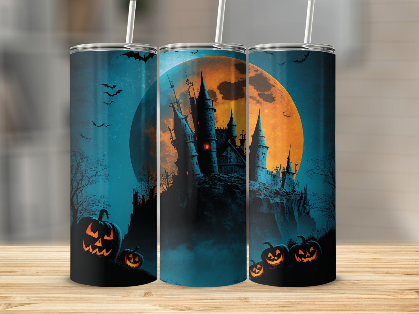 Halloween themed tumblers with spooky castle, full moon, bats, and jack-o'-lanterns.