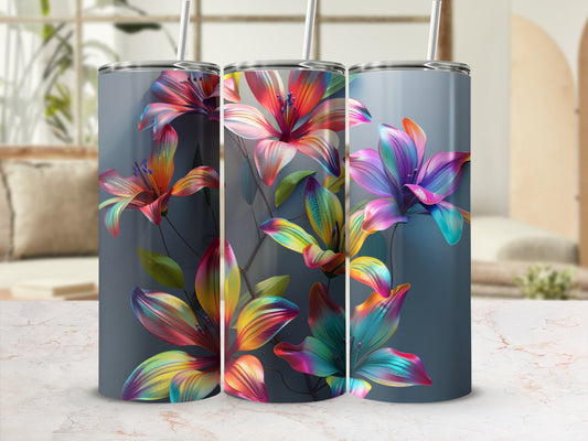 Three tumblers with colorful lily floral design and straws.