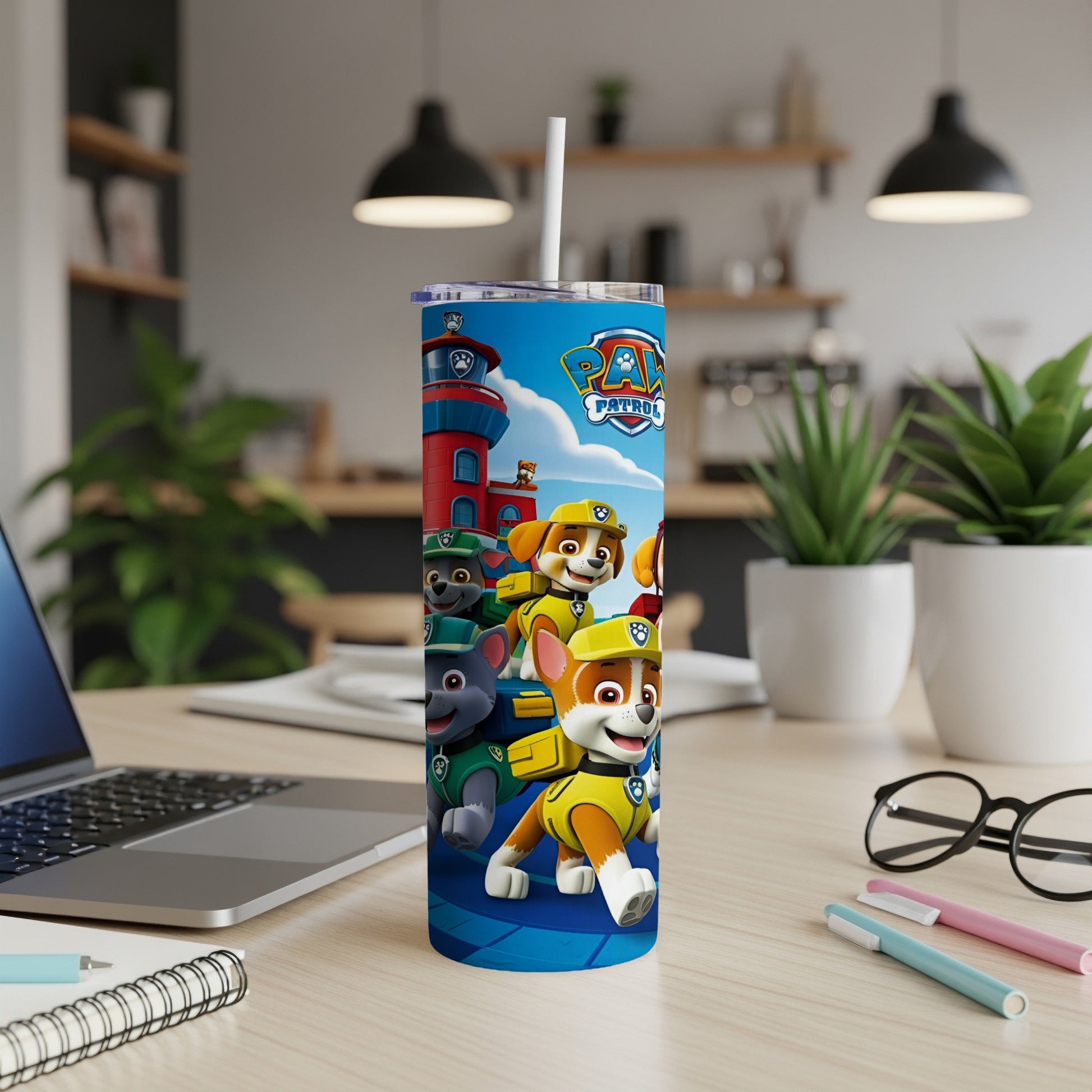 Paw Patrol characters on a blue tumbler with a lighthouse background.