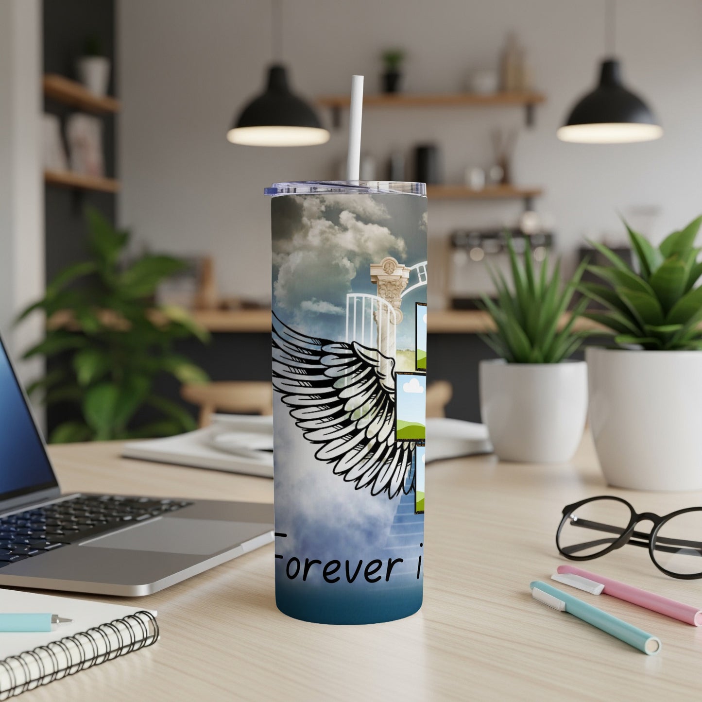 Tumbler with angel wings, clouds, and text "Forever i".
