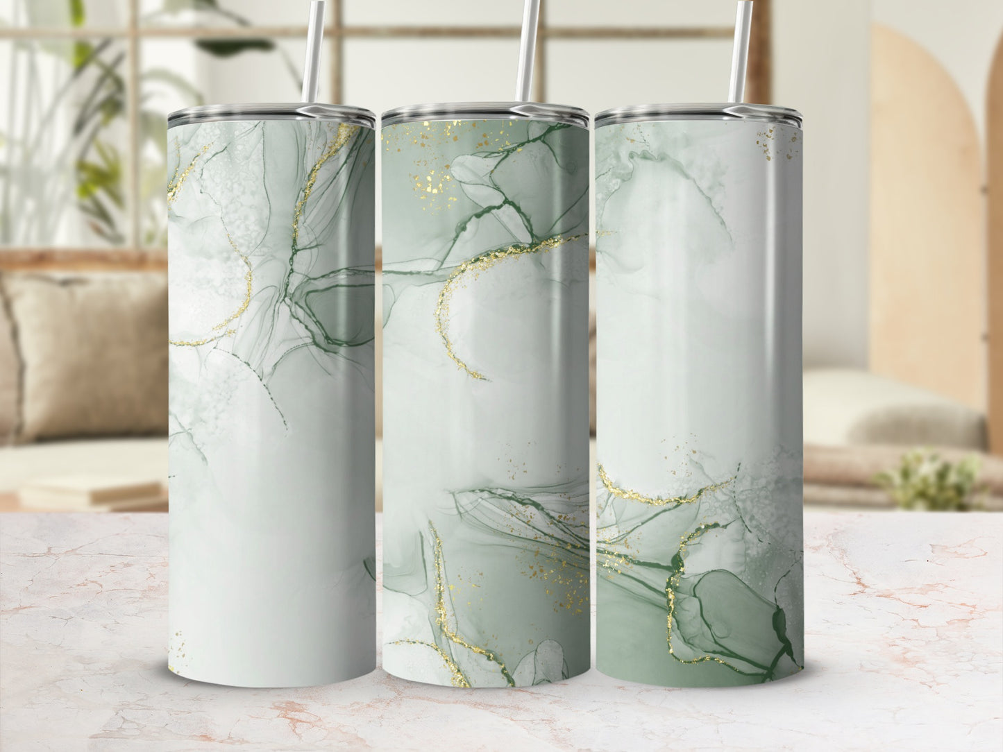 Three tumblers with green and gold abstract marbled design.