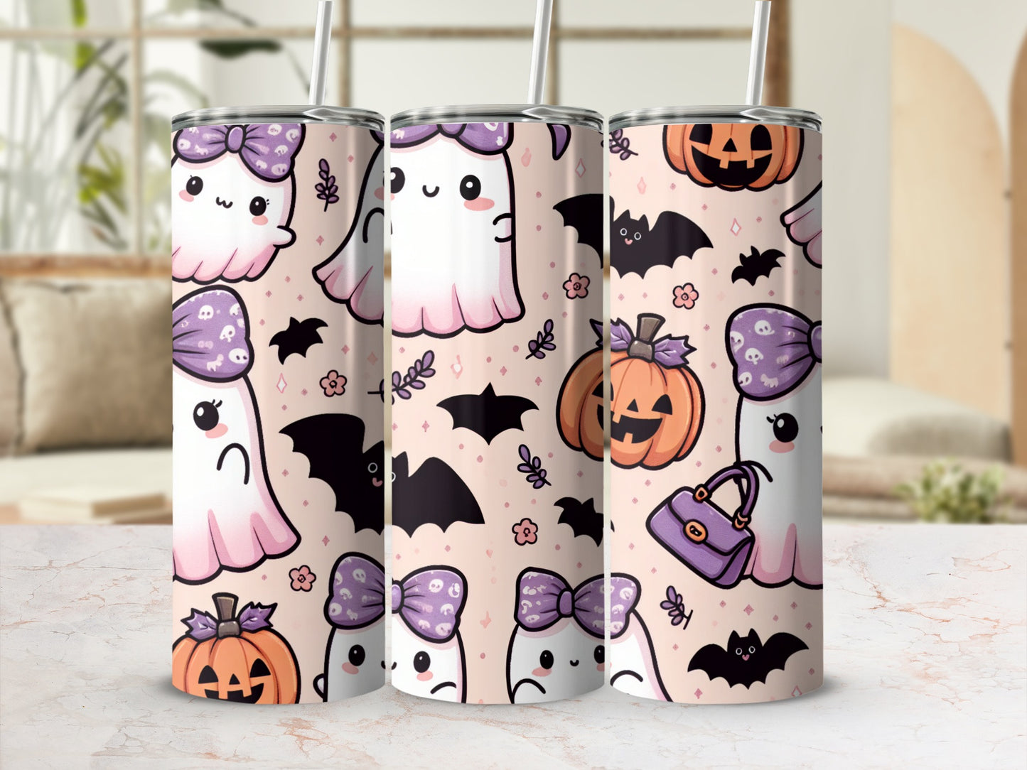 Three tumblers with cute ghost, pumpkin, and bat Halloween pattern.