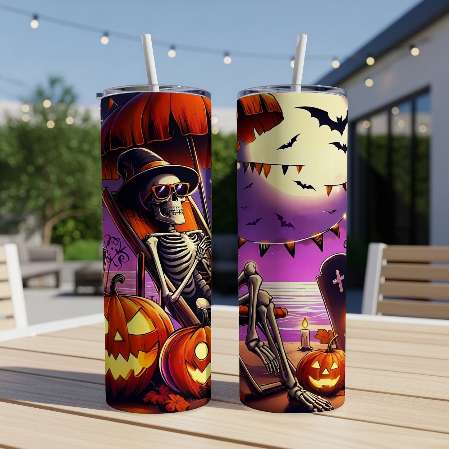 Two Halloween-themed tumblers featuring skeletons, pumpkins, bats, and a graveyard scene.