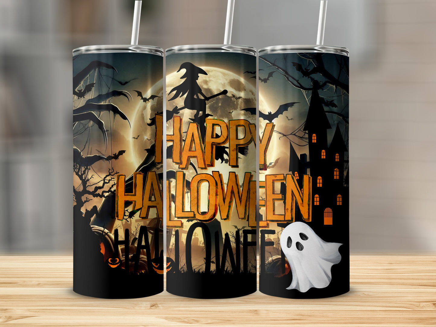 Three tumblers with Happy Halloween design, featuring a witch, ghost, and spooky scene.