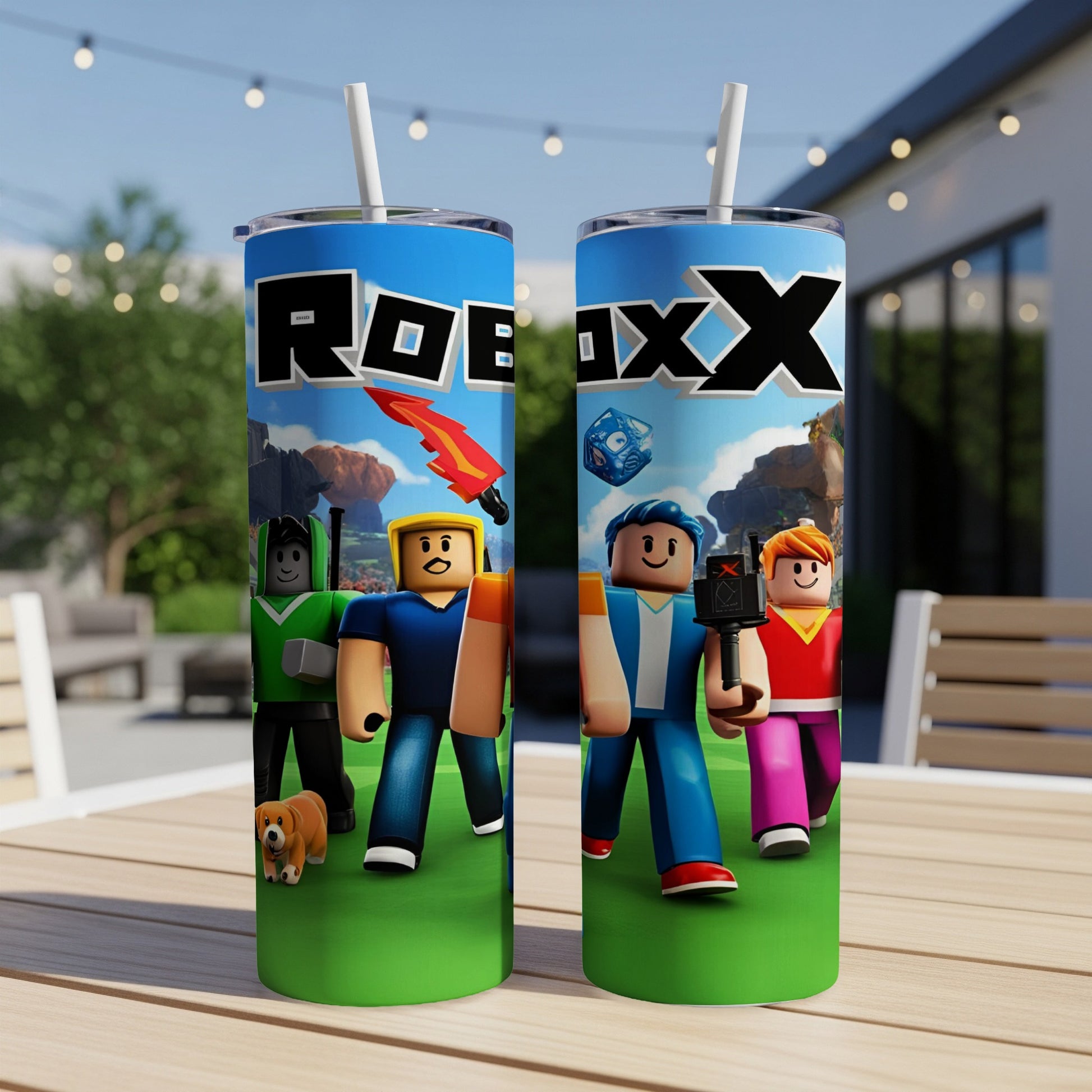 Roblox characters and logo on a blue tumbler with straw, outdoors.