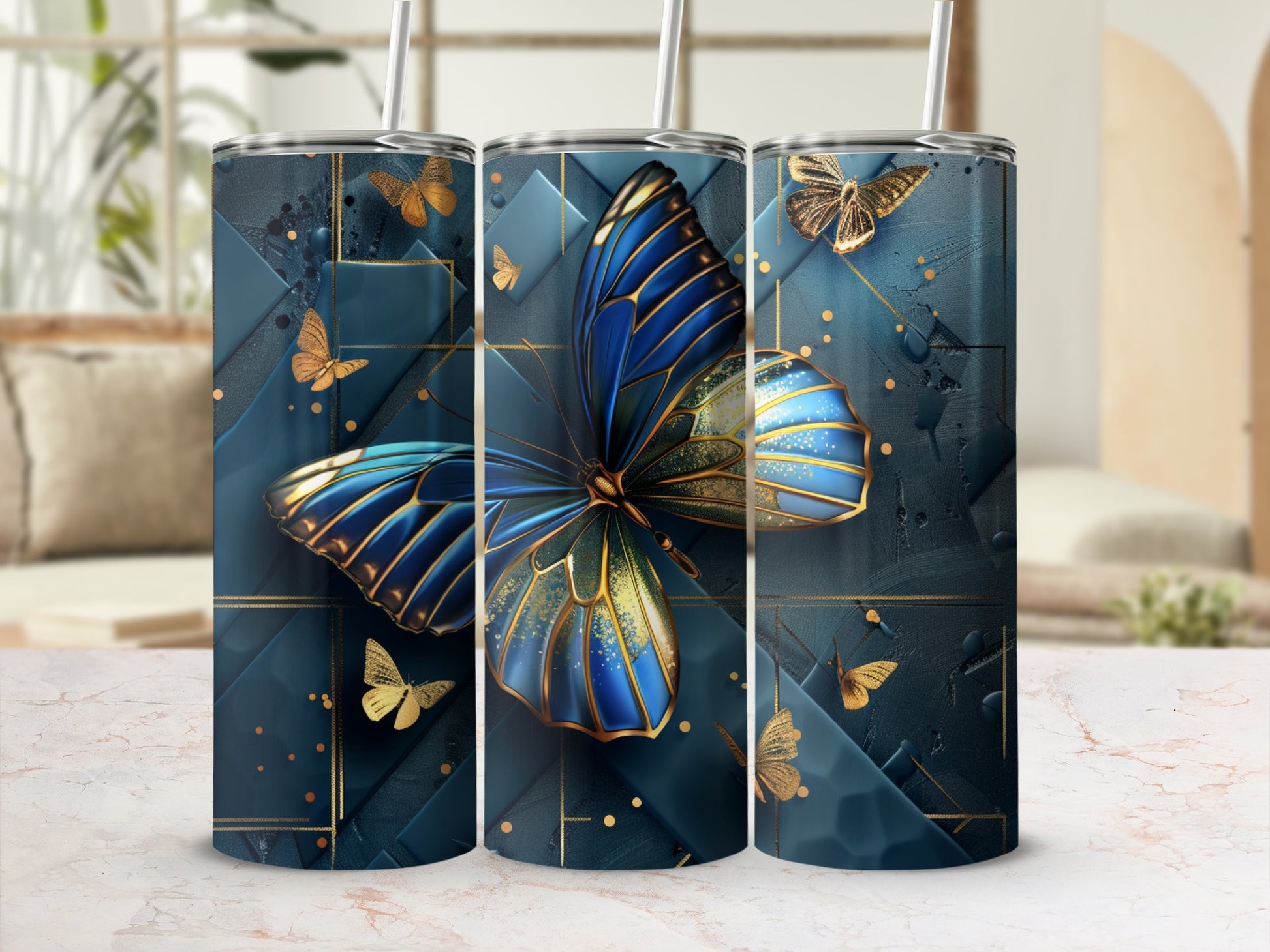 Tumbler with gold and blue butterfly pattern on dark blue background.