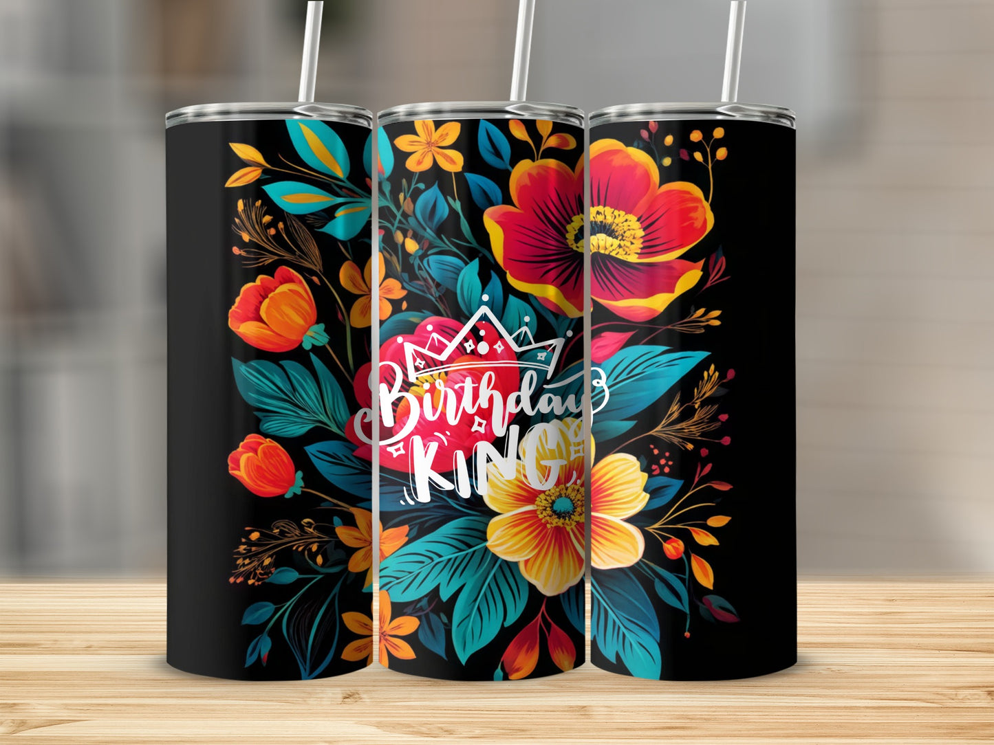 Black tumbler with colorful floral design and "Birthday King" text.